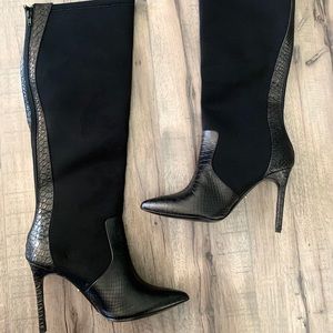 Charles Davis’s knee high boots